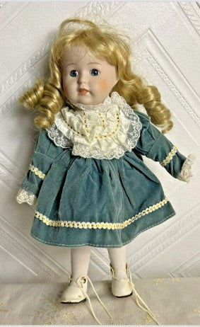 Doll Musical Porcelain blond curly hair -music works 14 inches