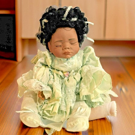 Doll African American weighted baby  made from  soft rubber  and  cloth body 19"