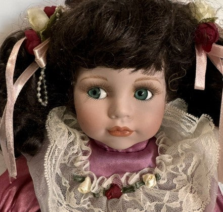 Doll  Sitting Musical Geppeddo 14" Brunette Hair with Blue Eyes