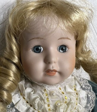 Doll Musical Porcelain blond curly hair -music works 14 inches