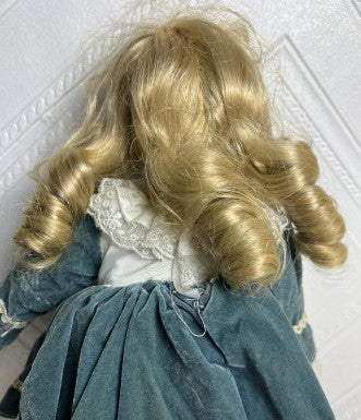 Doll Musical Porcelain blond curly hair -music works 14 inches