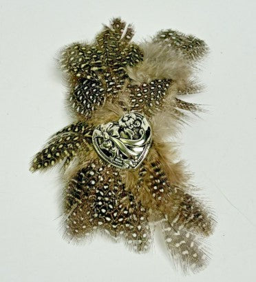 brooch  feather with silvertone heart in center 4.25 Inches