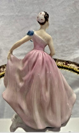 Royal Doulton figurine Invitation HN2170 was designed by Peggy Davies in 1956