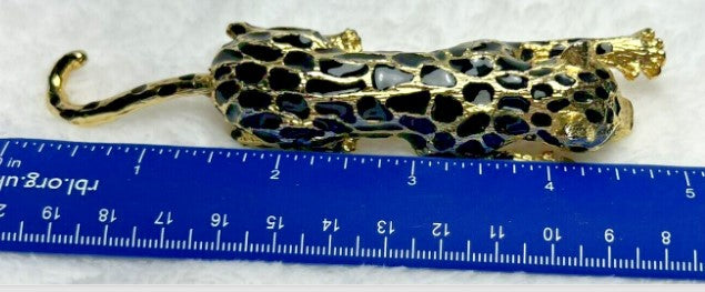 brooch- Large Cheetah Articulated tail  5 Inches heavy green rhinestone eyes